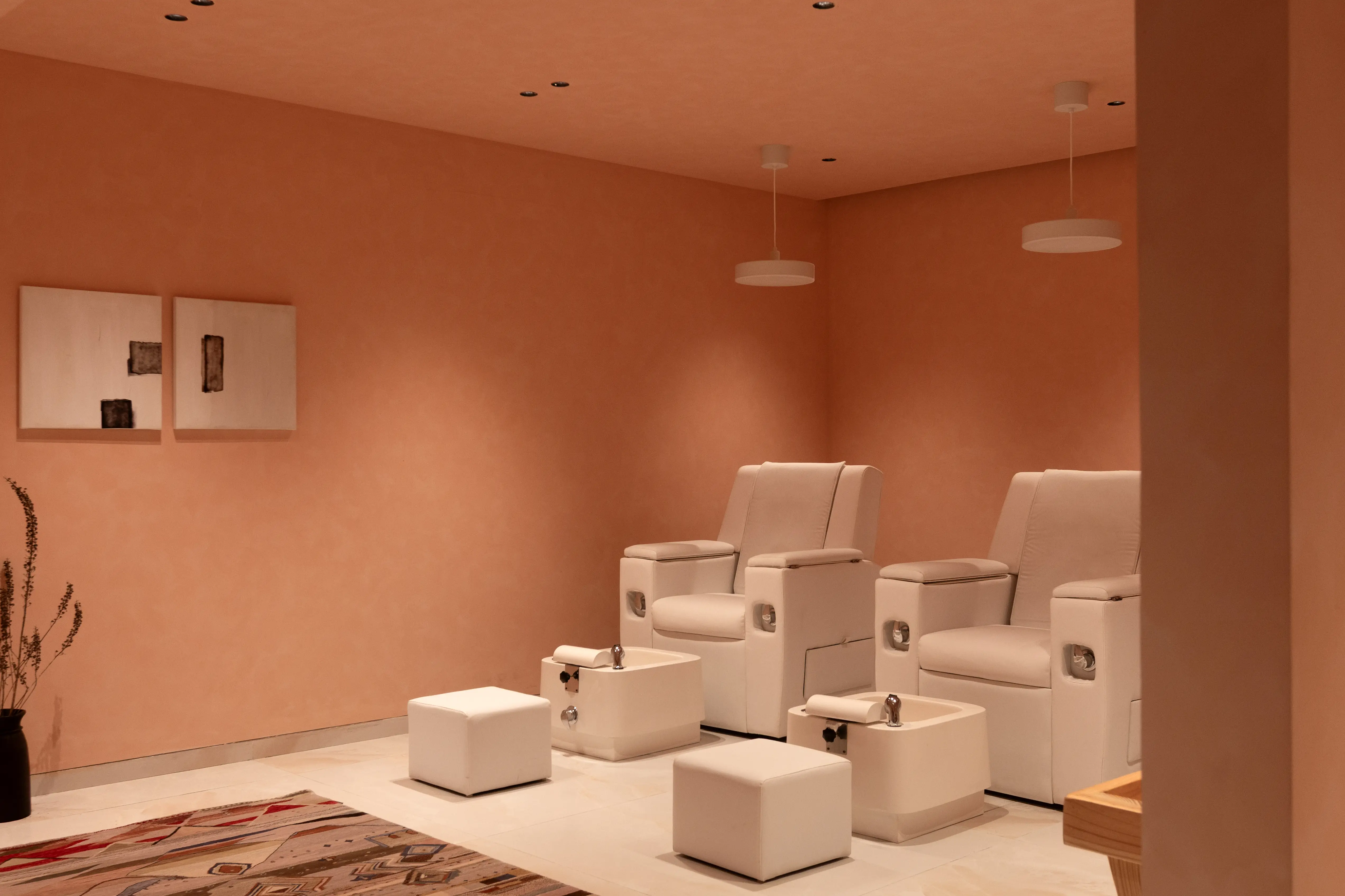 Lounge seating opening into the Le Clat styling bay