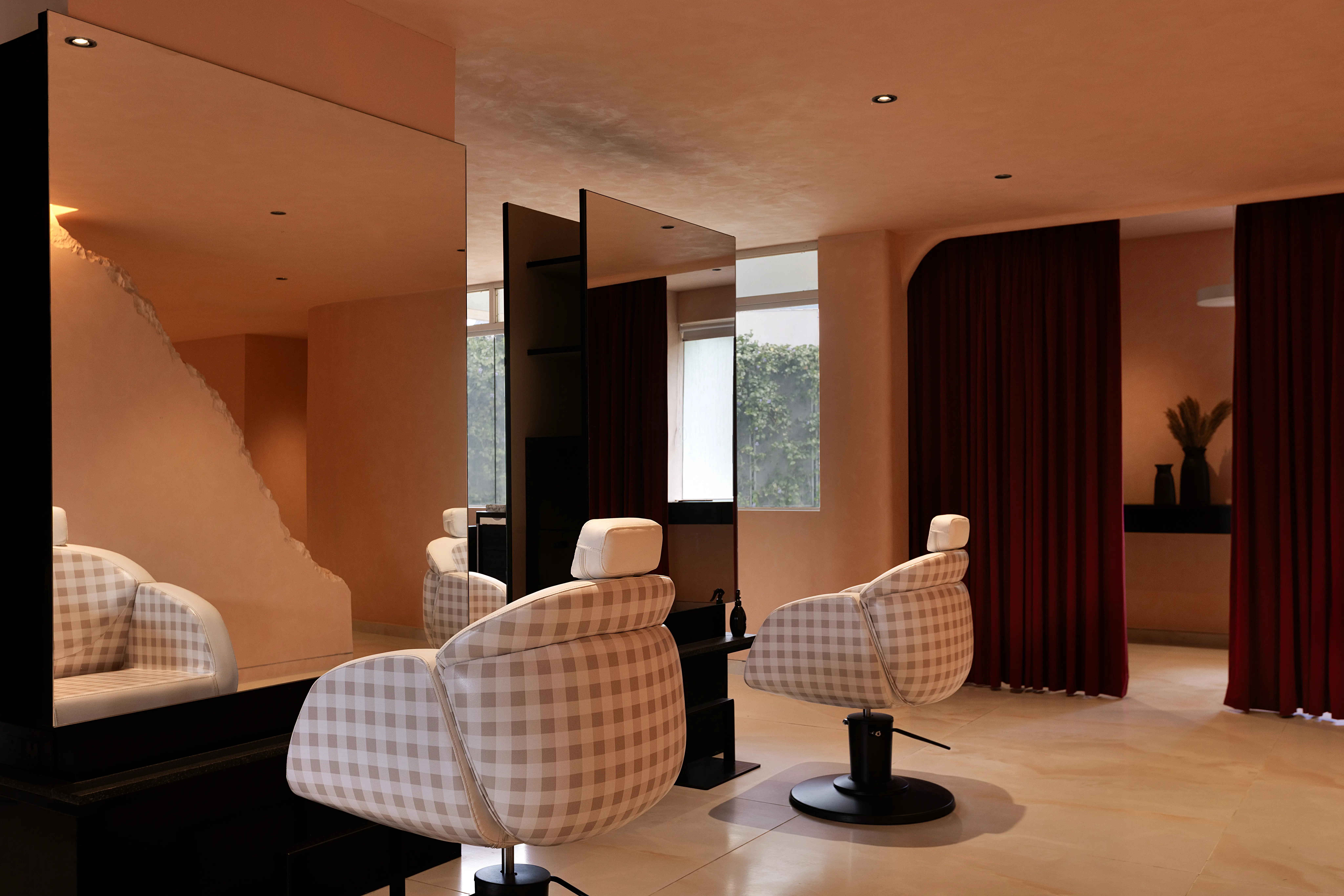 Spa suite dressed with layered linens and amber light